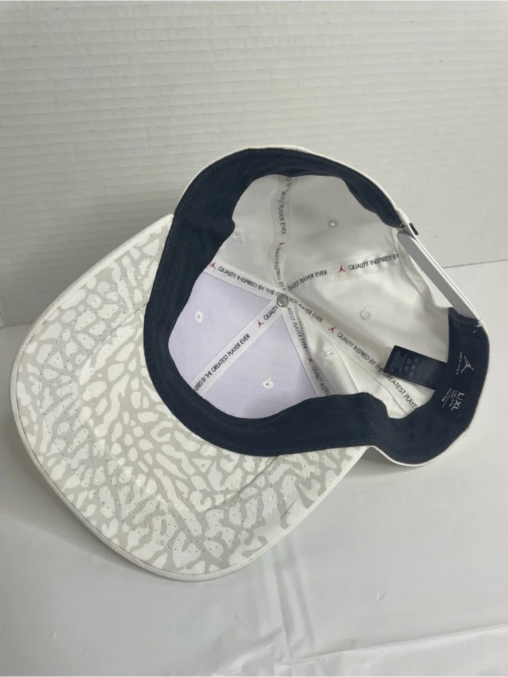 White Jordan Golf Dri-Fit adjustable SnapBack Cap with Black Jumpman Logo
